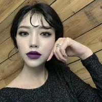 洛