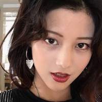 她是一场经久不散的风