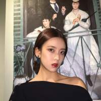她是一场经久不散的风