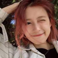 她是一场经久不散的风