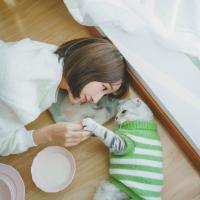 她的猫 我们每个人都得毫无怨