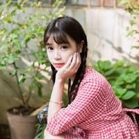 粉红格子衫女生 梦想会发光就是我不畏